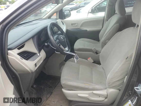 2016 Toyota Sienna L with VIN 5TDZK3DC4GS709089, listed as a Copart auction lot 58990195 with 153,182 mi miles and Salvage title. Bid and sale history available at DreamBid. Image 7.