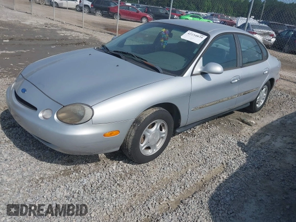 1997 Ford Taurus GL z VIN 1FALP52U9VA295404, wystawiony jako IAAI lot #42234839 z przebiegiem 163 080 mil mil oraz . Historia ofert i sprzedaży dostępna na DreamBid. Obrazek 2.