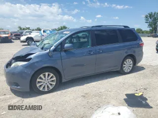 2015 Toyota Sienna LE with VIN 5TDJK3DC4FS107711, listed as a Copart auction lot 57693005 with 141,370 mi miles and Salvage title. Bid and sale history available at DreamBid. Image 1.