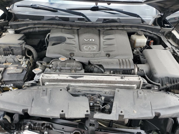 2012 Infiniti QX56 7-passenger z VIN JN8AZ2NE5C9021621, wystawiony jako Copart lot #53484825 z przebiegiem 139 453 mil mil oraz Szkoda całkowita • Salvage title. Historia ofert i sprzedaży dostępna na DreamBid. Obrazek 12.