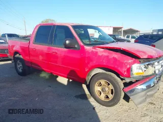 2003 Ford F-150 XLT with VIN 1FTRW07683KB26809, listed as a IAAI auction lot 41800242 with Not Provided miles. Bid and sale history available at carsss.com. Image 1.