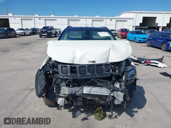 2021 Jeep Compass Latitude with VIN 3C4NJDBB7MT566237, listed as a IAAI auction lot 41747738 with 33,395 mi miles and . Bid and sale history available at DreamBid. Image 13.