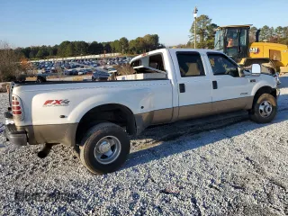 2003 Ford F-350 XL with VIN 1FTWW33F93EA39932, listed as a Copart auction lot 82341464 with 338,158 mi miles and Salvage Title. Bid and sale history available at DreamBid. Image 3.