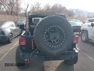 2009 Jeep Wrangler Unlimited Rubicon z VIN 1J4GA69159L749215, wystawiony jako IAAI lot #41489893 z przebiegiem 177 768 mil mil oraz . Historia ofert i sprzedaży dostępna na DreamBid. Obrazek 16.