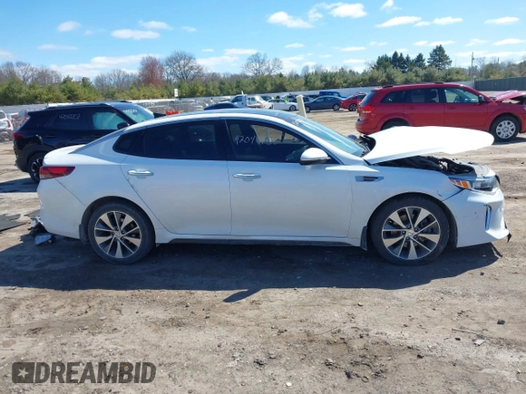 2018 Kia Optima S z VIN 5XXGT4L31JG256876, wystawiony jako IAAI lot #42046732 z przebiegiem 115 746 mil mil oraz . Historia ofert i sprzedaży dostępna na DreamBid. Obrazek 12.