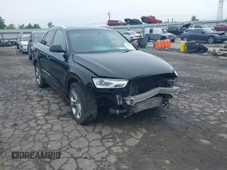 2017 Audi Q3 Premium Plus with VIN WA1JCCFS9HR010792, listed as a IAAI auction lot 42370894 with 99,034 mi miles and . Bid and sale history available at DreamBid. Image 1.