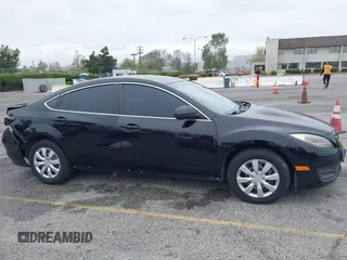 2012 Mazda 6 i Sport with VIN 1YVHZ8BH6C5M03802, listed as a IAAI auction lot 42041022 with 202,047 mi miles and . Bid and sale history available at carsss.com. Image 13.