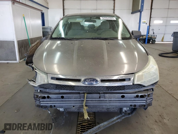 2009 Ford Focus SE with VIN 1FAHP35N39W235044, listed as a Copart auction lot 52953995 with 233,367 mi miles and Salvage Title. Bid and sale history available at carsss.com. Image 5.