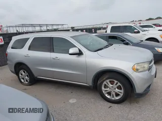 2013 Dodge Durango SXT with VIN 1C4RDHAG8DC647434, listed as a IAAI auction lot 42368085 with 77,533 mi miles and . Bid and sale history available at DreamBid. Image 13.