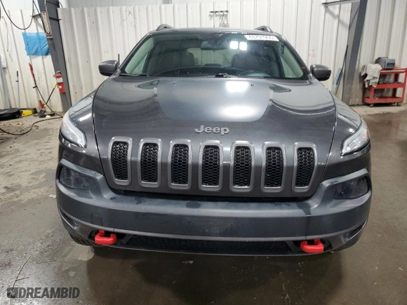 2015 Jeep Cherokee Trailhawk with VIN 1C4PJMBS6FW786085, listed as a Copart auction lot 48791955 with 123,574 mi miles and Salvage Title. Bid and sale history available at carsss.com. Image 5.