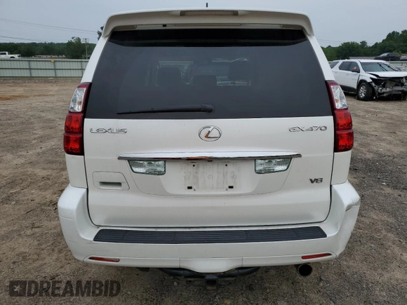 2009 Lexus GX 470 z VIN JTJBT20X690177574, wystawiony jako Copart lot #56981165 z przebiegiem 167 415 mil mil oraz Szkoda całkowita • Salvage title. Historia ofert i sprzedaży dostępna na DreamBid. Obrazek 6.
