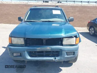 1998 Isuzu Rodeo S z VIN 4S2CM58W8W4328196, wystawiony jako IAAI lot #42323556 z przebiegiem 272 915 mil mil oraz . Historia ofert i sprzedaży dostępna na DreamBid. Obrazek 6.