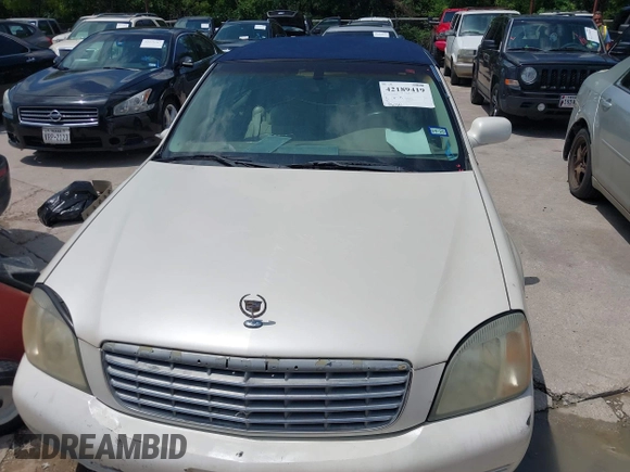 2002 Cadillac DeVille z VIN 1G6KD54Y42U206950, wystawiony jako IAAI lot #42189419 z przebiegiem 98 150 mil mil oraz . Historia ofert i sprzedaży dostępna na DreamBid. Obrazek 6.