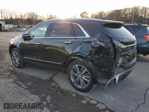 2022 Cadillac XT5 AWD Premium Luxury with VIN 1GYKNDR46NZ113732, listed as a Copart auction lot 82645394 with 26,862 mi miles and Salvage title. Bid and sale history available at DreamBid. Image 2.