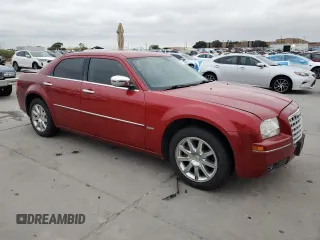 2010 Chrysler 300 Touring with VIN 2C3CA5CV8AH154245, listed as a Copart auction lot 71257774 with 121,489 mi miles and Salvage Title. Bid and sale history available at carsss.com. Image 4.