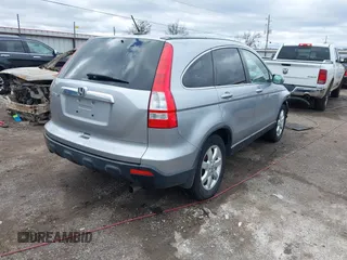 2007 Honda CR-V EX-L with VIN JHLRE48777C103364, listed as a IAAI auction lot 41216423 with 152,630 mi miles. Bid and sale history available at carsss.com. Image 4.