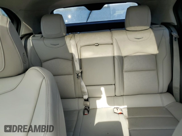 2021 Cadillac XT4 FWD Premium Luxury z VIN 1GYFZCR48MF056210, wystawiony jako Copart lot #73706384 z przebiegiem Nie podano mil oraz Nie do naprawy • Non repairable. Historia ofert i sprzedaży dostępna na DreamBid. Obrazek 10.