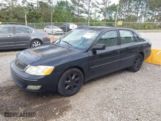 2002 Toyota Avalon XL with VIN 4T1BF28B42U248087, listed as a IAAI auction lot 42045427 with 290,170 mi miles. Bid and sale history available at carsss.com. Image 2.