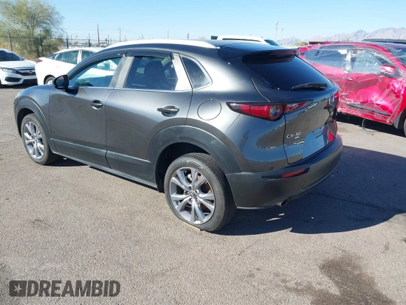 2022 Mazda CX-30 S Select z VIN 3MVDMBBL0NM415511, wystawiony jako IAAI lot #41513247 z przebiegiem Nie podano mil oraz . Historia ofert i sprzedaży dostępna na DreamBid. Obrazek 3.