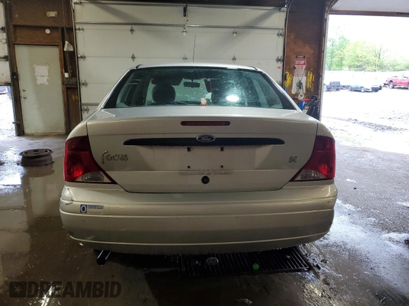 2003 Ford Focus SE z VIN 1FAFP34P43W186633, wystawiony jako Copart lot #56899065 z przebiegiem Nie podano mil oraz Szkoda całkowita • Salvage title. Historia ofert i sprzedaży dostępna na DreamBid. Obrazek 6.
