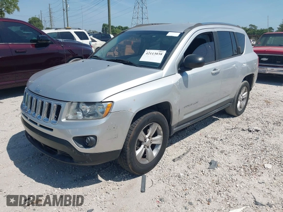 2012 Jeep Compass Sport with VIN 1C4NJCBA7CD660091, listed as a IAAI auction lot 42113038 with 123,181 mi miles. Bid and sale history available at carsss.com. Image 2.