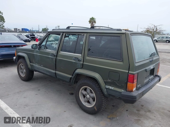 1996 Jeep Cherokee Sport z VIN 1J4FT68S6TL267408, wystawiony jako IAAI lot #42385629 z przebiegiem 268 753 mil mil oraz . Historia ofert i sprzedaży dostępna na DreamBid. Obrazek 3.