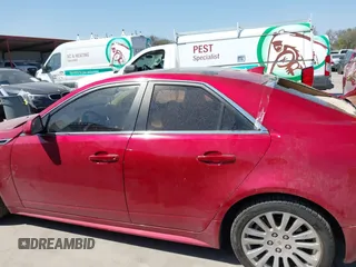 2012 Cadillac CTS Premium z VIN 1G6DP5E3XC0116312, wystawiony jako IAAI lot #41804403 z przebiegiem 148 570 mil mil oraz . Historia ofert i sprzedaży dostępna na DreamBid. Obrazek 14.