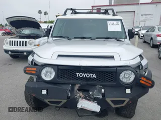 2007 Toyota FJ Cruiser with VIN JTEBU11F370036941, listed as a IAAI auction lot 42024330 with 164,703 mi miles. Bid and sale history available at carsss.com. Image 12.