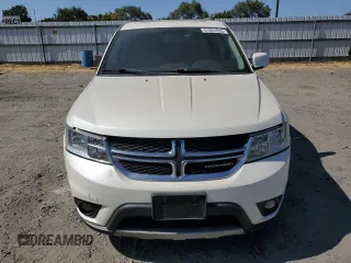 2013 Dodge Journey Crew with VIN 3C4PDCDG5DT668803, listed as a Copart auction lot 61931035 with 121,173 mi miles and Salvage title. Bid and sale history available at DreamBid. Image 5.