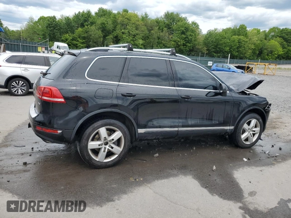 2012 Volkswagen Touareg Sport z VIN WVGEF9BP7CD009824, wystawiony jako Copart lot #58311915 z przebiegiem 154 397 mil mil oraz Szkoda całkowita • Salvage title. Historia ofert i sprzedaży dostępna na DreamBid. Obrazek 3.