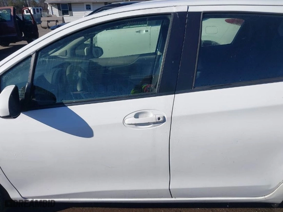 2014 Toyota Yaris L with VIN JTDKTUD31ED590687, listed as a IAAI auction lot 41190914 with 95,330 mi miles. Bid and sale history available at carsss.com. Image 14.