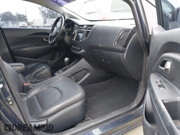 2013 Kia Rio SX with VIN KNADN4A30D6284121, listed as a IAAI auction lot 42109956 with 79,883 mi miles. Bid and sale history available at carsss.com. Image 5.