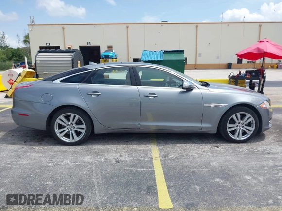 2013 Jaguar XJ with VIN SAJWJ1CD4D8V46305, listed as a IAAI auction lot 42637329 with 101,532 mi miles and . Bid and sale history available at DreamBid. Image 13.