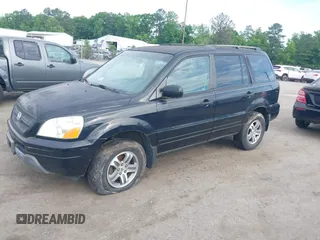 2004 Honda Pilot EX with VIN 5FNYF18574B008241, listed as a IAAI auction lot 42248581 with 267,334 mi miles and . Bid and sale history available at DreamBid. Image 2.