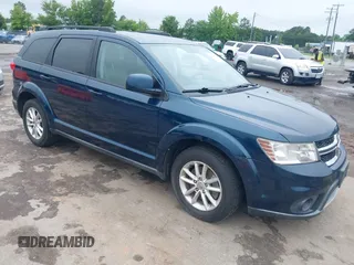 2014 Dodge Journey SXT z VIN 3C4PDCBG8ET126938, wystawiony jako IAAI lot #42526536 z przebiegiem 142 664 mil mil oraz . Historia ofert i sprzedaży dostępna na DreamBid. Obrazek 1.
