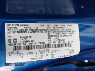2018 Ford Focus SE z VIN 1FADP3F29JL235302, wystawiony jako IAAI lot #42262964 z przebiegiem 85 127 mil mil oraz . Historia ofert i sprzedaży dostępna na DreamBid. Obrazek 9.