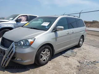 2007 Honda Odyssey EX-L with VIN 5FNRL38757B431334, listed as a IAAI auction lot 42026018 with 135,898 mi miles. Bid and sale history available at carsss.com. Image 2.