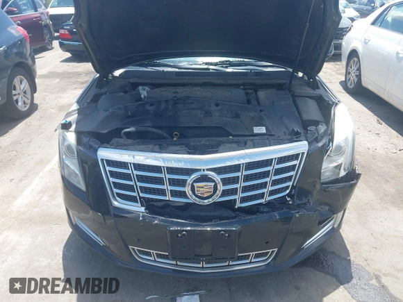 2013 Cadillac XTS Luxury z VIN 2G61P5S37D9101989, wystawiony jako IAAI lot #42242641 z przebiegiem 243 006 mil mil oraz . Historia ofert i sprzedaży dostępna na DreamBid. Obrazek 10.