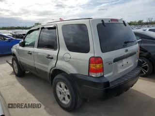2005 Ford Escape XLT with VIN 1FMYU93105KC50944, listed as a Copart auction lot 50500965 with 133,532 mi miles and Salvage Title. Bid and sale history available at DreamBid. Image 2.