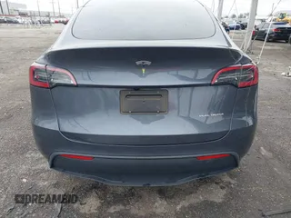 2023 Tesla Model Y Long Range with VIN 7SAYGDEE3PA152683, listed as a IAAI auction lot 41798988 with 14,063 mi miles and . Bid and sale history available at carsss.com. Image 16.