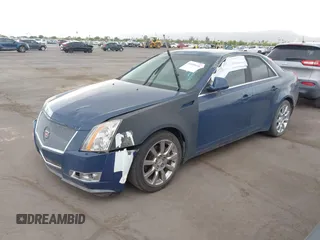 2009 Cadillac CTS RWD w/1SB with VIN 1G6DV57V690111847, listed as a IAAI auction lot 42189418 with 144,790 mi miles. Bid and sale history available at carsss.com. Image 2.