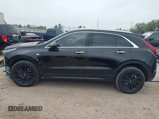 2023 Cadillac XT4 FWD Luxury with VIN 1GYAZAR49PF128552, listed as a IAAI auction lot 41806172 with 36,081 mi miles and . Bid and sale history available at carsss.com. Image 15.