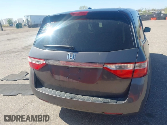 2012 Honda Odyssey EX-L with VIN 5FNRL5H61CB095789, listed as a IAAI auction lot 42065507 with 138,570 mi miles and . Bid and sale history available at DreamBid. Image 16.
