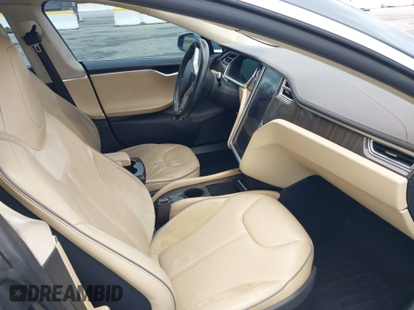 2013 Tesla Model S with VIN 5YJSA1CN8DFP21869, listed as a IAAI auction lot 41772603 with Not provided miles and . Bid and sale history available at DreamBid. Image 5.