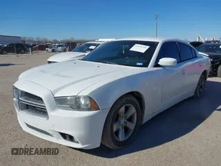 2014 Dodge Charger SXT with VIN 2C3CDXHG2EH104640, listed as a IAAI auction lot 41379760 with 122,664 mi miles and . Bid and sale history available at DreamBid. Image 17.