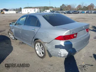 2005 Acura TSX with VIN JH4CL96955C005049, listed as a IAAI auction lot 40809563 with 140,000 mi miles. Bid and sale history available at carsss.com. Image 3.