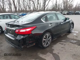 2016 Nissan Altima SR with VIN 1N4AL3AP8GC177922, listed as a IAAI auction lot 41802573 with 160,799 mi miles and . Bid and sale history available at carsss.com. Image 4.