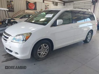 2005 Honda Odyssey EX with VIN 5FNRL38415B010150, listed as a IAAI auction lot 42844859 with 174,421 mi miles and . Bid and sale history available at DreamBid. Image 2.
