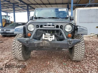 2013 Jeep Wrangler Unlimited Rubicon with VIN 1C4BJWFG5DL526884, listed as a Copart auction lot 47800225 with 112,207 mi miles and Salvage Title. Bid and sale history available at carsss.com. Image 5.