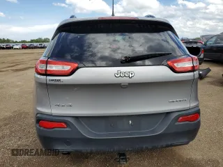2016 Jeep Cherokee Sport with VIN 1C4PJMAB4GW203807, listed as a Copart auction lot 61429655 with 96,128 mi miles and Salvage title. Bid and sale history available at DreamBid. Image 6.